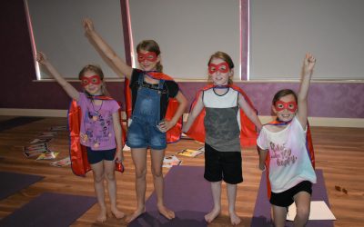 4 grandchildren wearingHero Capes and feeling empowered at the Jazzy, Pinky & the Energy Ball program